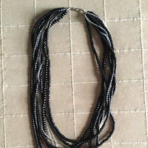 Women's 9 strands plastic beaded necklace 19" black and white multilayer
